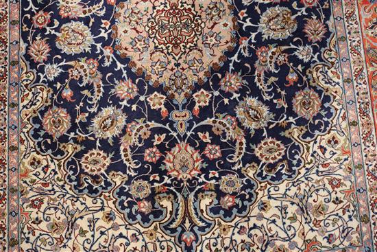 A Tabriz blue medallion rug 222 x 156cm.